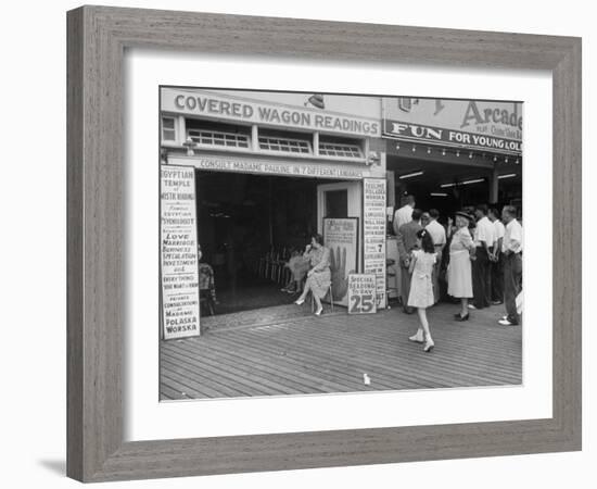 Fortune Teller Booth Next to a Penny Arcade on the Boardwalk in the Resort and Convention City-Alfred Eisenstaedt-Framed Photographic Print