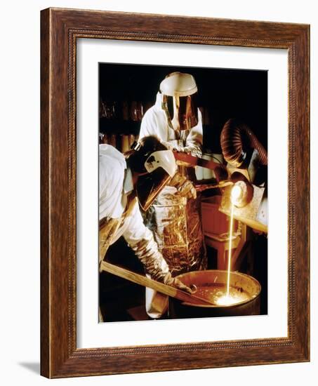 Foundry Workers Pouring Molten Metal Into An Ingot-Tek Image-Framed Photographic Print