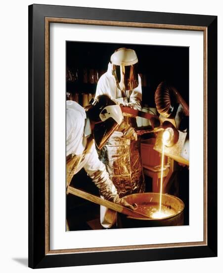 Foundry Workers Pouring Molten Metal Into An Ingot-Tek Image-Framed Photographic Print