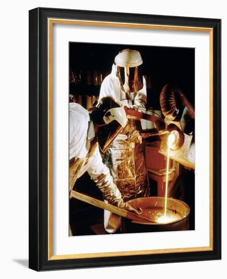 Foundry Workers Pouring Molten Metal Into An Ingot-Tek Image-Framed Photographic Print