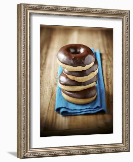 Four Doughnuts with Chocolate Glaze, Stacked-Michael Löffler-Framed Photographic Print