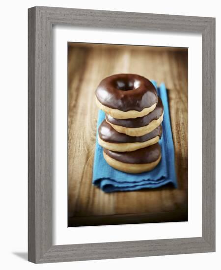 Four Doughnuts with Chocolate Glaze, Stacked-Michael Löffler-Framed Photographic Print