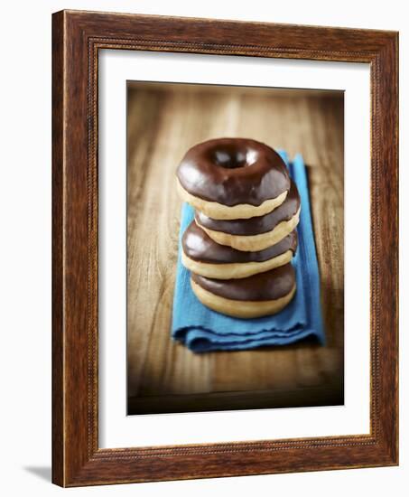 Four Doughnuts with Chocolate Glaze, Stacked-Michael Löffler-Framed Photographic Print