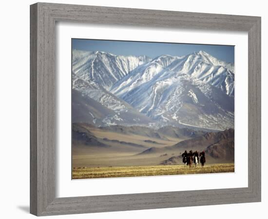 Four Eagle Hunters in Tolbo Sum, Golden Eagle Festival, Mongolia-Amos Nachoum-Framed Photographic Print