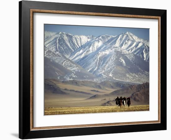 Four Eagle Hunters in Tolbo Sum, Golden Eagle Festival, Mongolia-Amos Nachoum-Framed Photographic Print