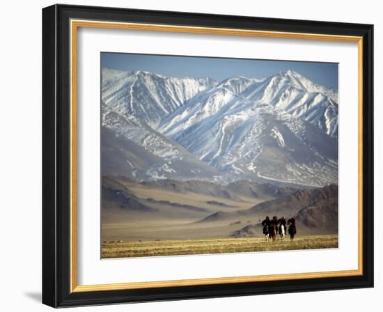 Four Eagle Hunters in Tolbo Sum, Golden Eagle Festival, Mongolia-Amos Nachoum-Framed Photographic Print