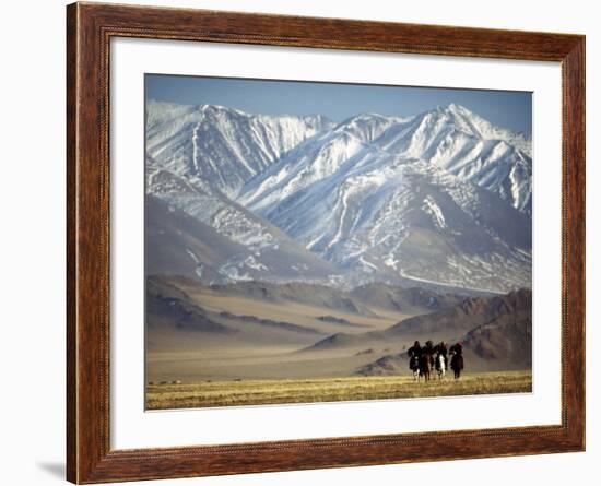 Four Eagle Hunters in Tolbo Sum, Golden Eagle Festival, Mongolia-Amos Nachoum-Framed Photographic Print