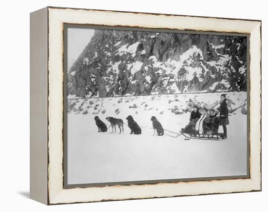 Four Girls on Dog Sled Photograph - Canada-Lantern Press-Framed Stretched Canvas