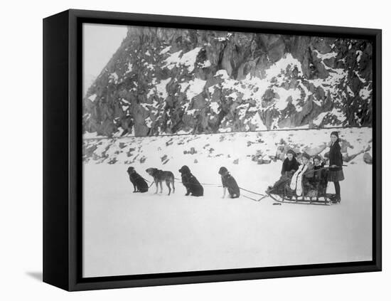 Four Girls on Dog Sled Photograph - Canada-Lantern Press-Framed Stretched Canvas