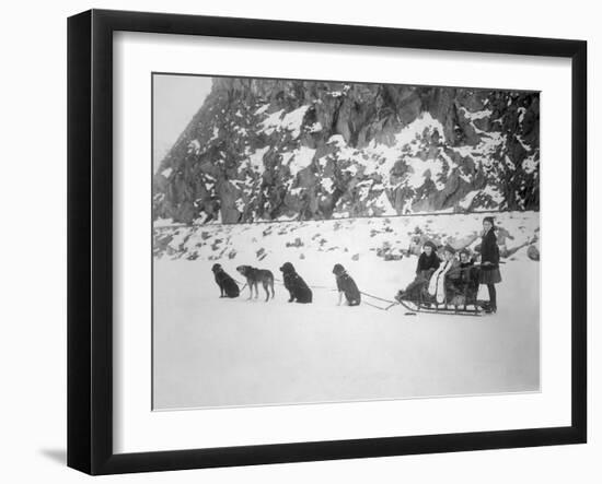 Four Girls on Dog Sled Photograph - Canada-Lantern Press-Framed Art Print
