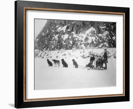 Four Girls on Dog Sled Photograph - Canada-Lantern Press-Framed Art Print