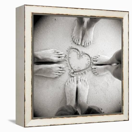 Four Pairs of Feet Standing around a Heart Shape Drawn in Sandy Beach, Taransay, Scotand, UK-Lee Frost-Framed Premier Image Canvas