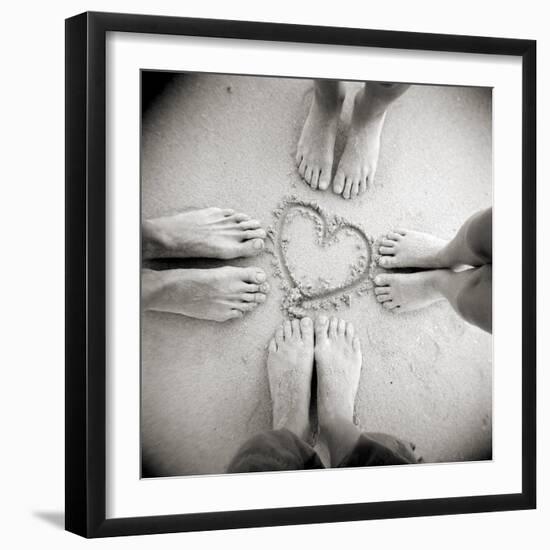 Four Pairs of Feet Standing around a Heart Shape Drawn in Sandy Beach, Taransay, Scotand, UK-Lee Frost-Framed Photographic Print