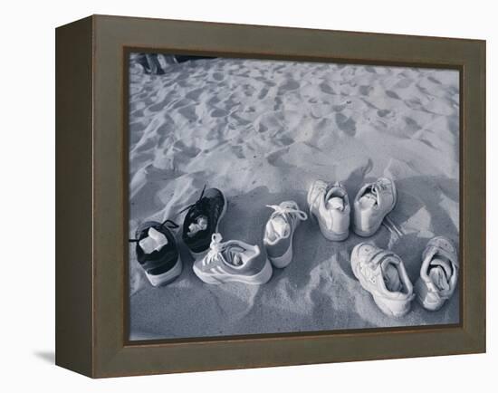 Four Pairs of Shoes on the Sand-Mitch Diamond-Framed Premier Image Canvas