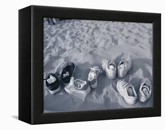 Four Pairs of Shoes on the Sand-Mitch Diamond-Framed Premier Image Canvas