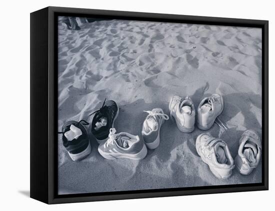 Four Pairs of Shoes on the Sand-Mitch Diamond-Framed Premier Image Canvas