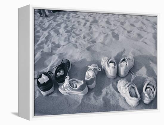 Four Pairs of Shoes on the Sand-Mitch Diamond-Framed Premier Image Canvas