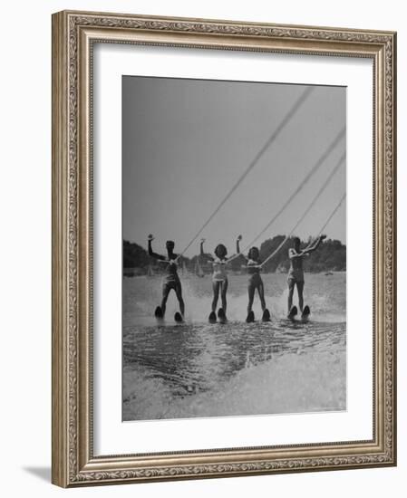 Four People Competing in the National Water Skiing Championship Tournament-Mark Kauffman-Framed Photographic Print