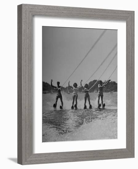 Four People Competing in the National Water Skiing Championship Tournament-Mark Kauffman-Framed Photographic Print