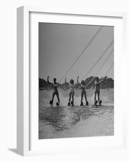 Four People Competing in the National Water Skiing Championship Tournament-Mark Kauffman-Framed Photographic Print