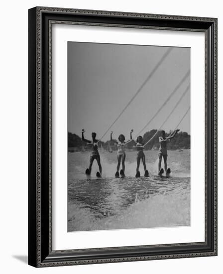 Four People Competing in the National Water Skiing Championship Tournament-Mark Kauffman-Framed Photographic Print