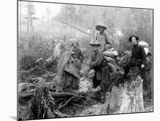 Four Prospectors Posed on Trail in Alaska During the Yukon Gold Rush in 1897-null-Mounted Photo