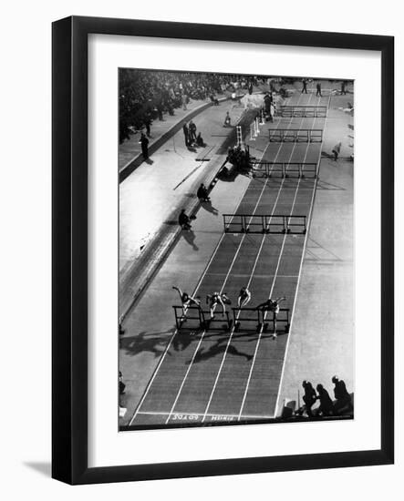 Four Runners Clearing Hurdles in 60 Yard Dash at Mellrose Games-Gjon Mili-Framed Photographic Print