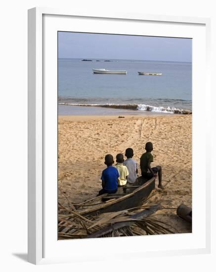 Four Small Boys Look Out to Sea from Where They Sit on Bamboo Fishing Boat on Island of Princip�-Camilla Watson-Framed Photographic Print