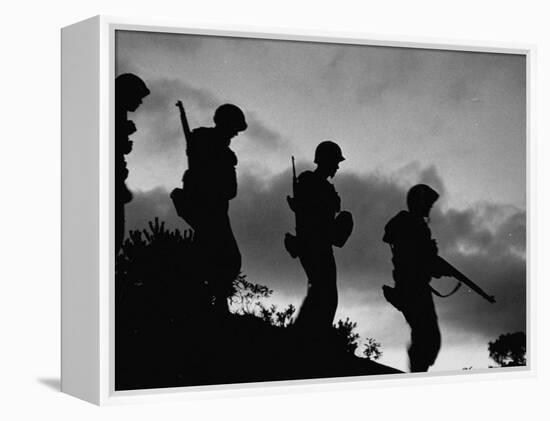 Four Soldiers with Helmets and Rifles Moving on Crest of Ridge, on Patrol at Night-Michael Rougier-Framed Premier Image Canvas