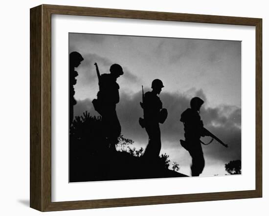 Four Soldiers with Helmets and Rifles Moving on Crest of Ridge, on Patrol at Night-Michael Rougier-Framed Photographic Print