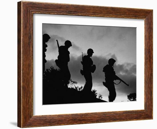 Four Soldiers with Helmets and Rifles Moving on Crest of Ridge, on Patrol at Night-Michael Rougier-Framed Photographic Print