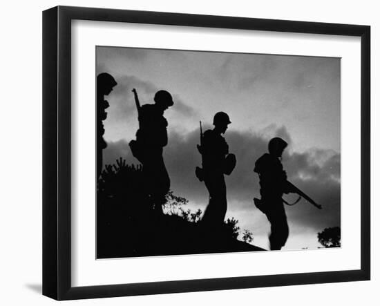 Four Soldiers with Helmets and Rifles Moving on Crest of Ridge, on Patrol at Night-Michael Rougier-Framed Photographic Print