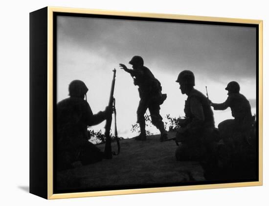 Four Soldiers with Helmets and Rifles Moving on Crest of Ridge, Patroling at Night-Michael Rougier-Framed Premier Image Canvas