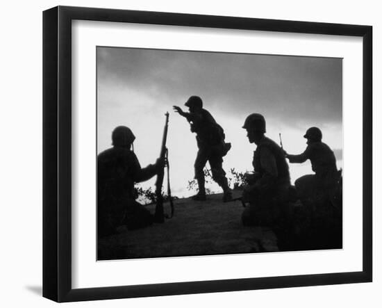 Four Soldiers with Helmets and Rifles Moving on Crest of Ridge, Patroling at Night-Michael Rougier-Framed Photographic Print