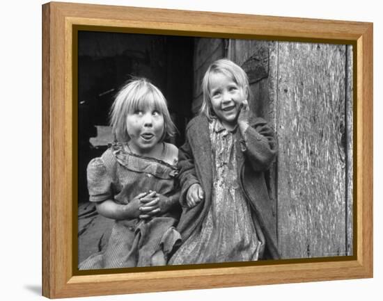 Four Year Old Flora and Her Sister Jacqueline Couch, 6 Smiling at the Camera-Eliot Elisofon-Framed Premier Image Canvas