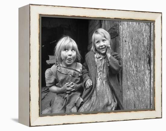Four Year Old Flora and Her Sister Jacqueline Couch, 6 Smiling at the Camera-Eliot Elisofon-Framed Premier Image Canvas