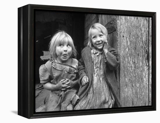 Four Year Old Flora and Her Sister Jacqueline Couch, 6 Smiling at the Camera-Eliot Elisofon-Framed Premier Image Canvas