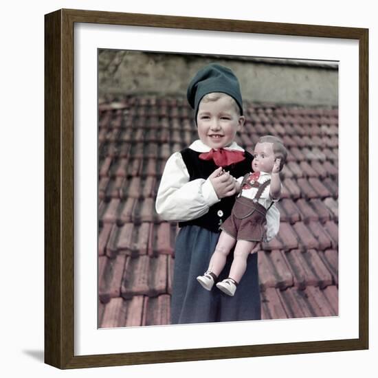 Four Year Old German Boy Stands with His Lederhosen Dressed Doll, Ca. 1949-null-Framed Photographic Print