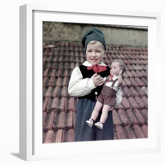 Four Year Old German Boy Stands with His Lederhosen Dressed Doll, Ca. 1949-null-Framed Photographic Print