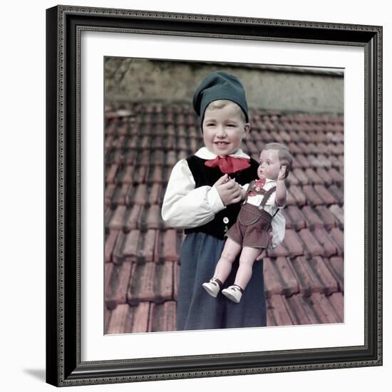 Four Year Old German Boy Stands with His Lederhosen Dressed Doll, Ca. 1949-null-Framed Photographic Print