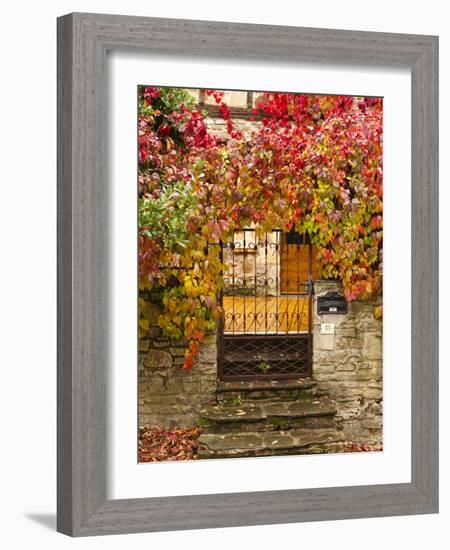 France, Midi-Pyrenees Region, Tarn Department, Cordes-Sur-Ciel, Gate with Autumn Foliage-Walter Bibikow-Framed Photographic Print