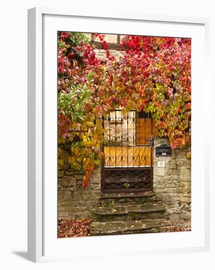 France, Midi-Pyrenees Region, Tarn Department, Cordes-Sur-Ciel, Gate with Autumn Foliage-Walter Bibikow-Framed Photographic Print