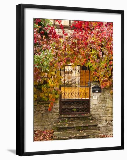 France, Midi-Pyrenees Region, Tarn Department, Cordes-Sur-Ciel, Gate with Autumn Foliage-Walter Bibikow-Framed Photographic Print