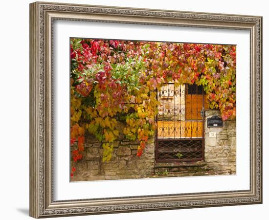 France, Midi-Pyrenees Region, Tarn Department, Cordes-Sur-Ciel, Gate with Autumn Foliage-Walter Bibikow-Framed Photographic Print