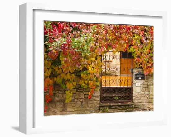 France, Midi-Pyrenees Region, Tarn Department, Cordes-Sur-Ciel, Gate with Autumn Foliage-Walter Bibikow-Framed Photographic Print