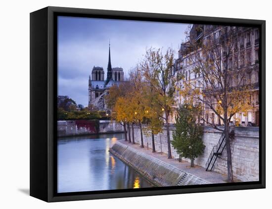 France, Paris, Cathedral Notre Dame Cathedral and Ile St-Louis, Dawn-Walter Bibikow-Framed Premier Image Canvas