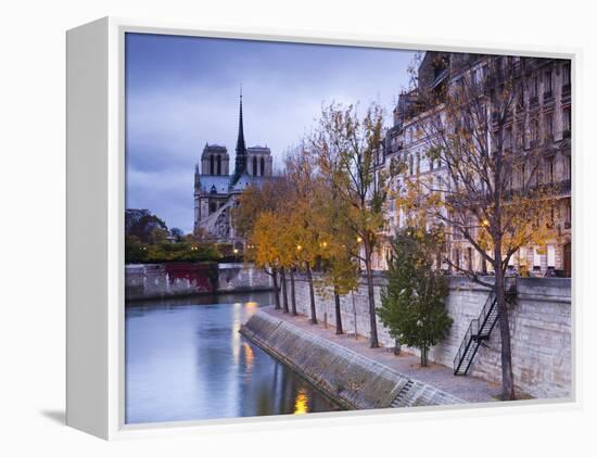 France, Paris, Cathedral Notre Dame Cathedral and Ile St-Louis, Dawn-Walter Bibikow-Framed Premier Image Canvas