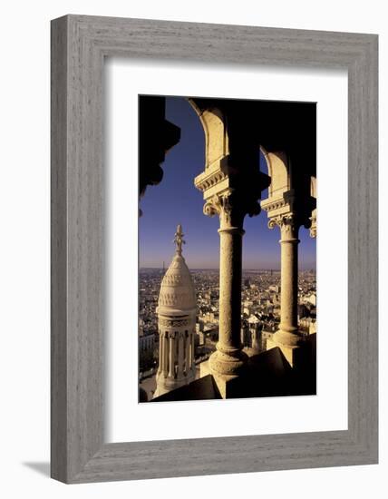 FRANCE, Paris.  View from Sacre-Coeur de Basilica through arches-Inger Hogstrom-Framed Photographic Print