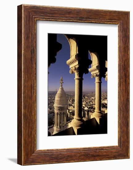 FRANCE, Paris.  View from Sacre-Coeur de Basilica through arches-Inger Hogstrom-Framed Photographic Print