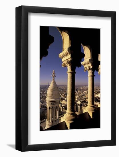 FRANCE, Paris.  View from Sacre-Coeur de Basilica through arches-Inger Hogstrom-Framed Photographic Print